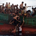 ماليزيا تنفي إبعادها قارباً يقل مئات المهاجرين